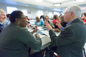 educator presenting to group of people