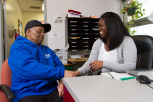 support staff discussing with client